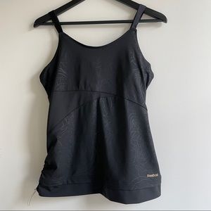 Reebok workout tank with adjustable straps and built in bra, size L